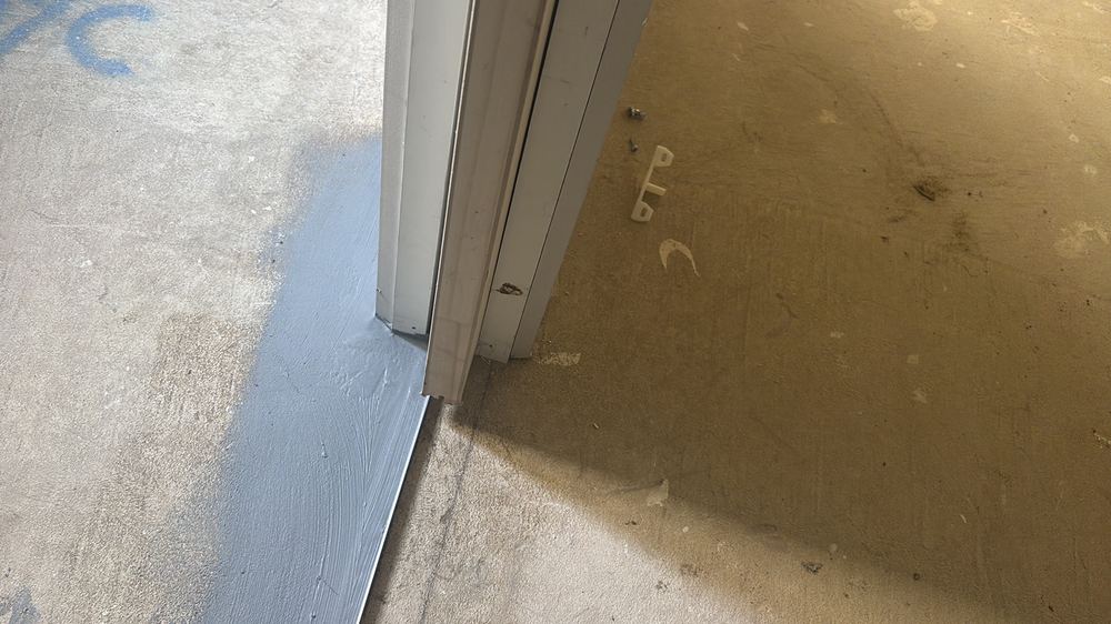 Cavity sliding door missing its rail guide, so it rubs the frame, found during a fixing inspection in Hoppers Crossing
