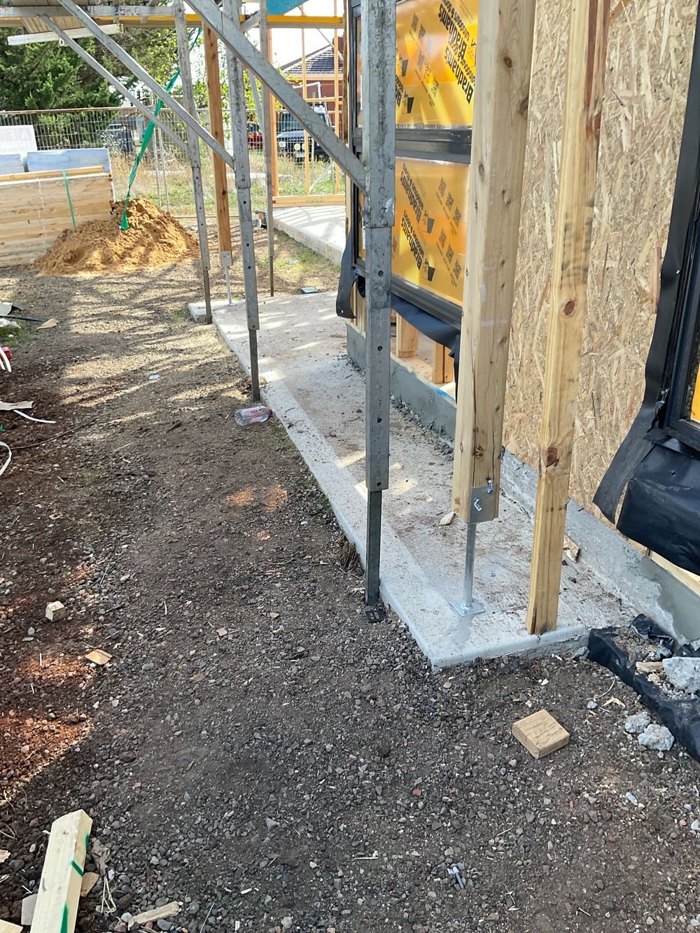 Vapour barrier not visible at ground level around the slab edge, found during a frame inspection in Hoppers Crossing