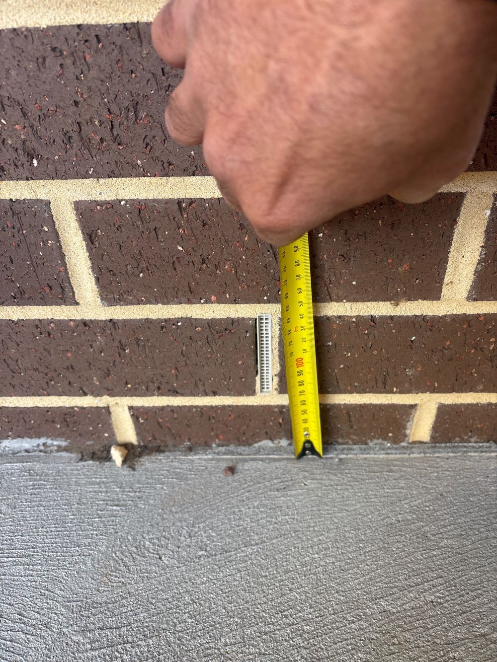 Weep holes sitting lower above the finished ground than the minimum allows, found during a pre-handover inspection in Wyndham Vale