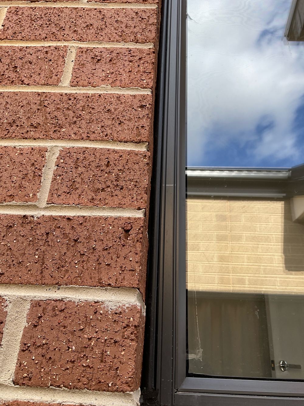 Gap between window frame and cladding too wide for the flashing to cover, found during a pre-handover inspection in Wyndham Vale