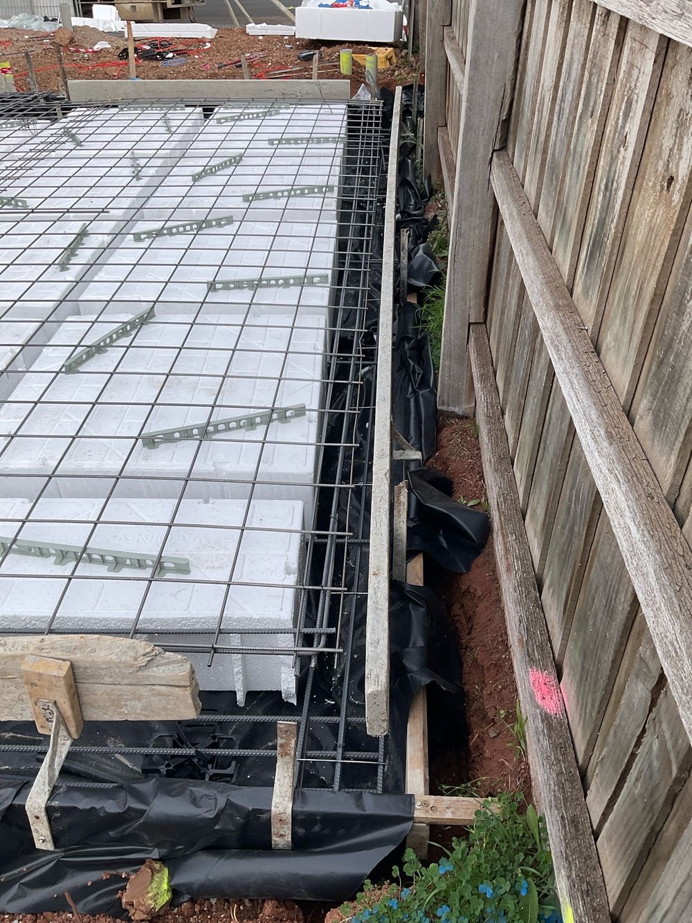 Strip drain to the garage edge beam not yet completed, found during a slab pre-pour inspection in Hoppers Crossing